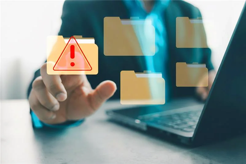 Data loss prevention software blocking unauthorized data transfer